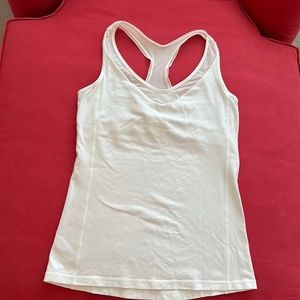 Lululemon tank SZ 8. While with lined shelf bra.
